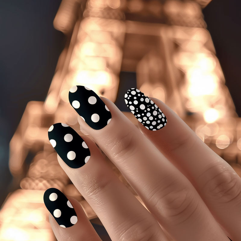 Nail art - black and white polka dots